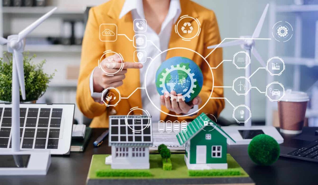 Frau zeigt auf Weltkugel